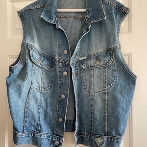 Women’s sleeveless vintage Guess denim light wash vest. Size L